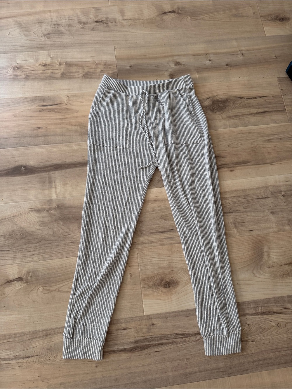 grey and white size small caution to the wind joggers